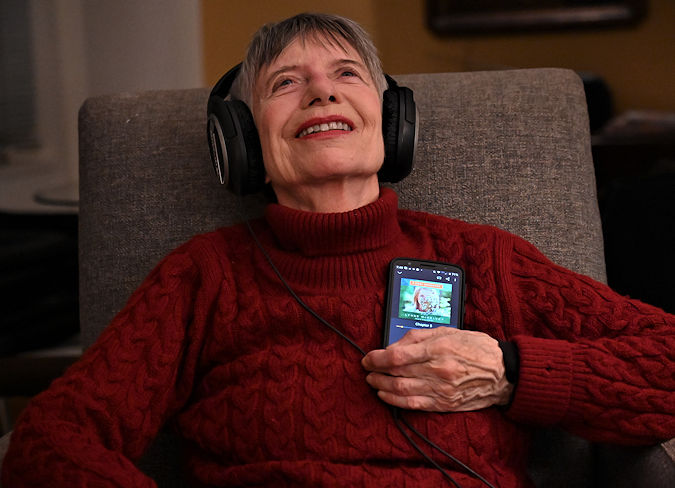 Author Lynne McKelvey listening to the Audiobook